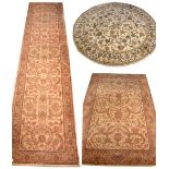 Three modern machine-made carpets comprising a Royal Keshan Jaipur cream ground carpet, 300 x 200cm,