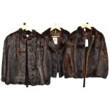 Three vintage c1950s brown mink jackets to include two examples with stand-up collars,