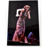 KATE BUSH; a colour photograph inscribed 'To Lisa,