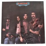 EAGLES; a 'Desperado' 33rpm record with inscription and bearing various signatures to the sleeve.