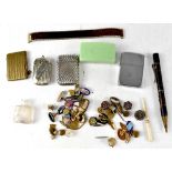 A collector's lot comprising cufflinks, vesta cases, a gilt metal stamp case, a Zippo lighter, etc.