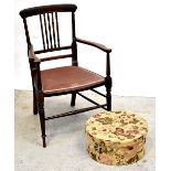 An Edwardian walnut inlaid open arm elbow chair with upholstered seat,