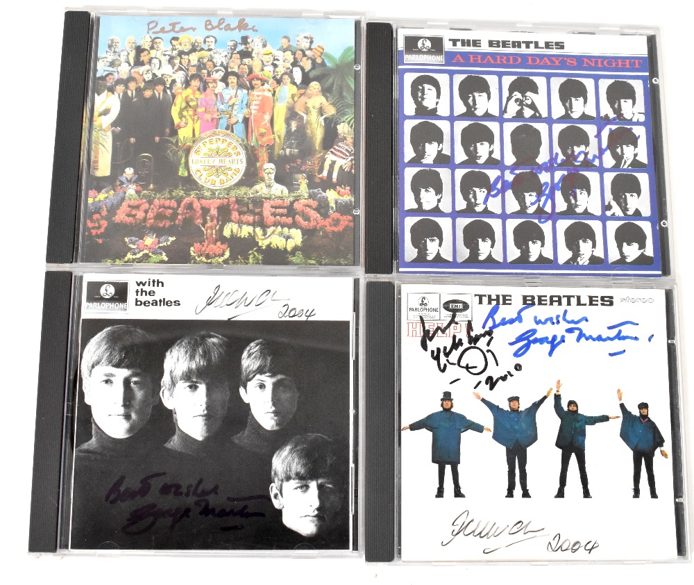 THE BEATLES RELATED; four CDs bearing signatures including Yoko Ono,