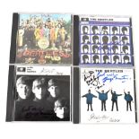 THE BEATLES RELATED; four CDs bearing signatures including Yoko Ono,
