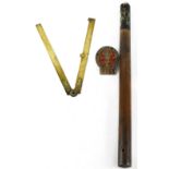 A Victoria 18979 truncheon/staff, black painted top with large gold and red painted crown, 'V.R.