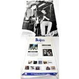 THE BEATLES; a group of posters detailing albums when CDs came into effect (af).