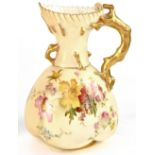 A Royal Worcester blush ivory baluster vase with fluted rim,