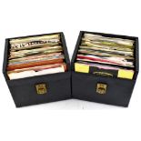 A quantity of 45rpm singles contained within two carrying cases, including Adam and the Ants,