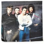 QUEEN; a coloured photographic image bearing the signatures of Freddie Mercury, John Deacon,