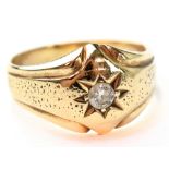 A gentlemen's vintage hallmarked 9ct gold signet ring with star cut gypsy set diamond brilliant