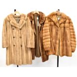 Three vintage mink coats comprising a honey mink three-quarter length coat with rear collar,