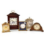 Four mantel clocks comprising a Pennington & Patty of Liverpool oak-cased Elliot clock,