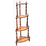 A Victorian inlaid walnut whatnot with four graduated tiers and wrythen twist and bobbin turned