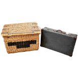 A very large wicker lidded basket, 57 x 88 x 60cm and a leather-bound canvas suitcase inscribed 'J.