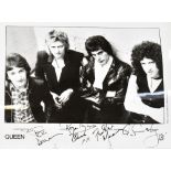 QUEEN; a black and white photograph bearing the signatures of Freddie Mercury,