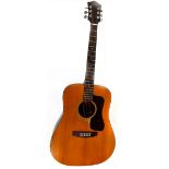 A late 1960s all original Guild acoustic six string acoustic guitar, paper label to the interior,