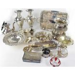 A quantity of silver-plated items to include a pair of baluster vases with fluted necks and lion
