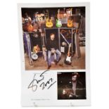 ERIC CLAPTON; a page from a magazine bearing the signature of the star dated 2007,