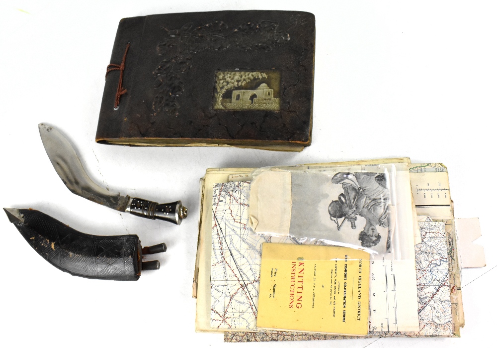 A leather bound photograph album containing a quantity of photographs from WWI to WWII depicting