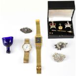 A cased set of decorative miniature crown jewels to include orb, crown, etc,