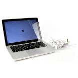 A 13" Apple Macbook Pro Model No.A1278 (partially obscured), serial no.W88949DTY66D.