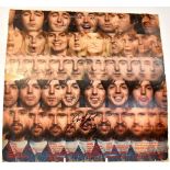 WINGS; the back cover of an album sleeve bearing the signatures of Paul McCartney,