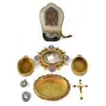 A small group of 19th century ecclesiastical items to include four brass reliquary containers,