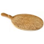 Robert 'Mouseman' Thompson; a carved oval cheese board with typical carved mouse to the handle,
