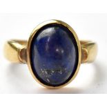 An 18ct gold gentlemen's signet ring with bezel set lapis cabochon, size Q, approx 5.5g.