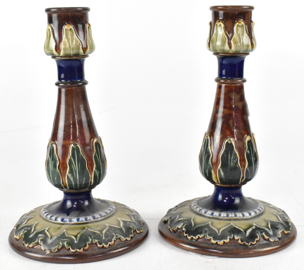 ROYAL DOULTON; a pair of Royal Doulton Secessionist candlesticks,