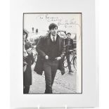 PAUL MCCARTNEY; a printed black and white photograph inscribed 'To Brian,