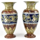 ROYAL DOULTON; a large pair of baluster vases,