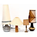 Two c1970s retro tall pottery table lamps to include a grey pierced example with hessian shade with