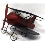 A scratch-built tin plate model of a biplane, wing span 100cm, length 92cm.