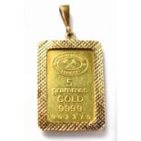 A Johnson Matthey, London five grammes 9999 gold tablet in a 9ct gold necklace mount, size 2.
