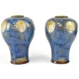 ROYAL DOULTON; a pair of Secessionist baluster vases,