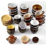 A large quantity of 19th century salt glazed earthenware to include bowls, side plates, etc.