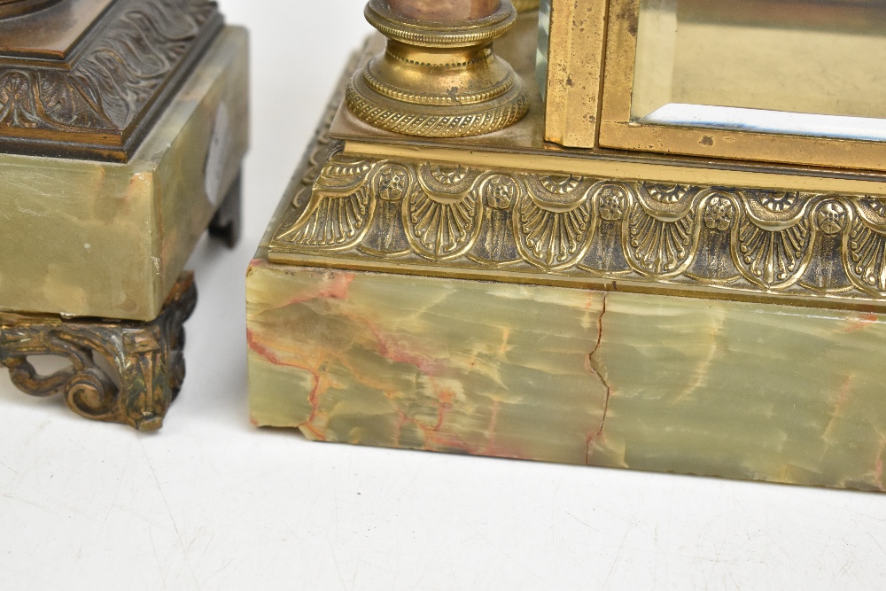 MARTI ET CIE; a late 19th century French onyx, gilt metal and porcelain mantel clock garniture, - Image 6 of 12