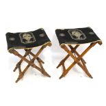 A pair of beech folding stools, with applied tapestry decorated with Grecian urns, height 53cm.