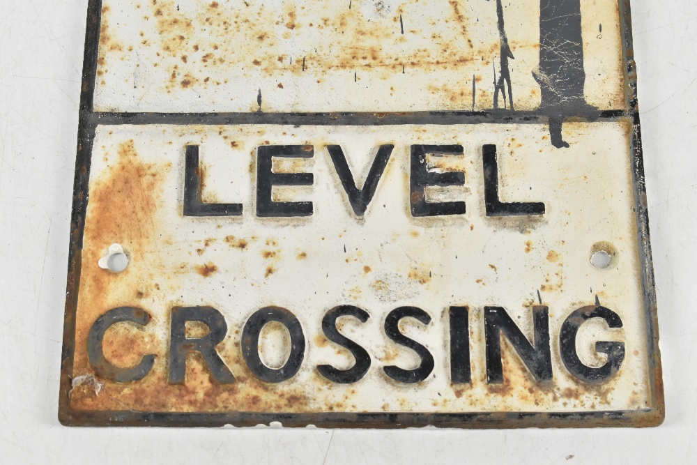 A cast metal advertising sign 'Level Crossing', 58 x 29cm.Additional InformationKnocks, scuffs, - Bild 3 aus 5