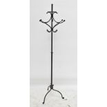 A modern wrought metal hat stand, on tripod base, made in two sections, height 183cm.