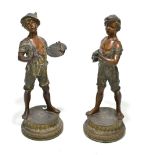 A pair of late 19th/early 20th century Art Nouveau spelter figures, the first modelled as an