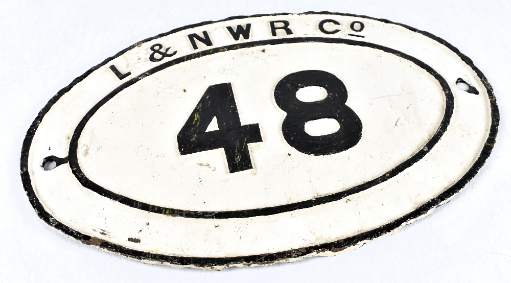 LONDON & NORTH WESTERN RAILWAY; a painted cast metal bridge plate, number 48, height 29cm, length