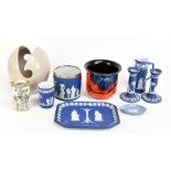 WEDGWOOD; a 19th century three piece blue jasperware dressing table set comprising a tray, a pair of