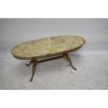 An onyx and gilt metal oval coffee table, height 46cm, width 120cm.Additional InformationGrubby