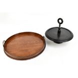 A 19th century mahogany circular tray, with brass handles and raised gallery section, diameter 45cm,
