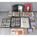 Assortment of mint and used world stamps in two albums, mostly GB, plus two small stock books and