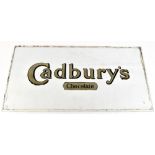 A pair of early 20th century Cadbury's Chocolate glass advertising shop window panes, approx 48 x