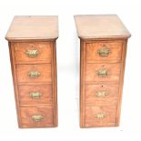 A pair of Victorian walnut bowfronted bedside cabinets with four drawers, height 82cm, depth