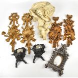 A pair of modern gilt wood twin branch wall sconces modelled with musical instruments, one with